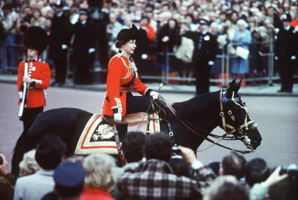 Queen Elizabeth II rides Burmese during the Trooping of the Colour ceremony at Buckingham Palace in June 1985 in London, England.